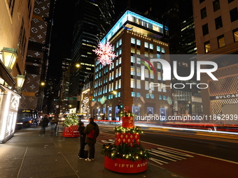 A snowflake hangs outside the exterior of Tiffany's on 57th St. and Fifth Avenue in New York, N.Y., on December 12, 2024. The photo is taken...