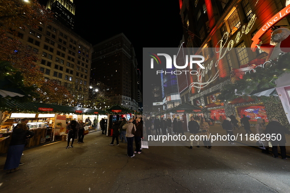 The Christmas decorations are outside Macy's Department Store in New York, N.Y., on December 12, 2024. The photo is taken as a long exposure...