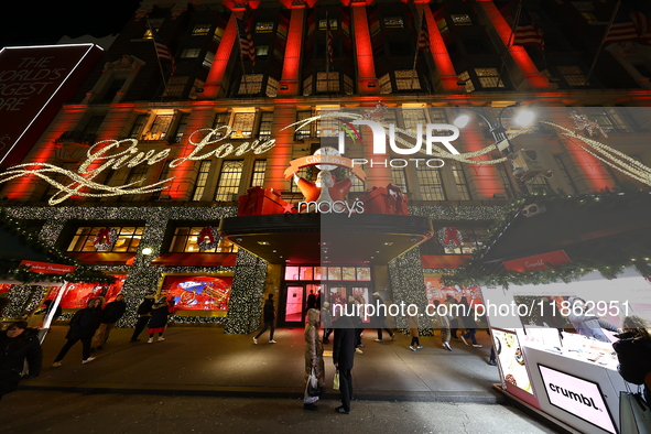 The Christmas decorations are outside Macy's Department Store in New York, N.Y., on December 12, 2024. The photo is taken as a long exposure...