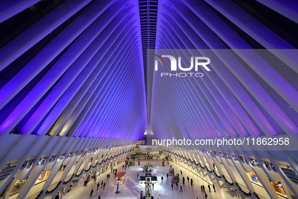 The colorful lights are inside the Oculus Transportation Hub and mall at the World Trade Center in New York, N.Y., on December 12, 2024. The...