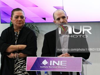 Guadalupe Taddei, president of the National Electoral Institute (INE), and electoral counselor Arturo Castillo participate in a press confer...