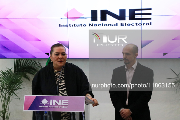 Guadalupe Taddei, president of the National Electoral Institute (INE), and electoral counselor Arturo Castillo participate in a press confer...