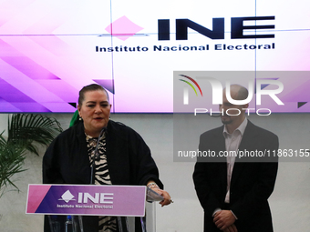 Guadalupe Taddei, president of the National Electoral Institute (INE), and electoral counselor Arturo Castillo participate in a press confer...