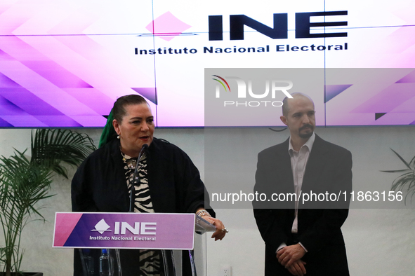 Guadalupe Taddei, president of the National Electoral Institute (INE), and electoral counselor Arturo Castillo participate in a press confer...