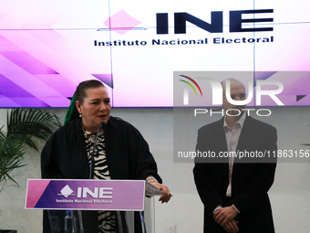 Guadalupe Taddei, president of the National Electoral Institute (INE), and electoral counselor Arturo Castillo participate in a press confer...