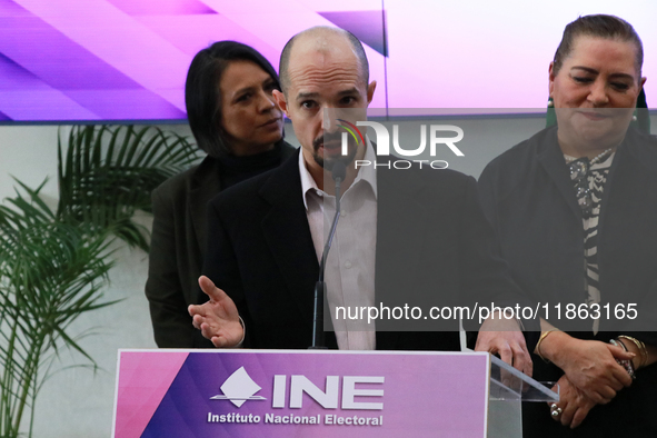 Guadalupe Taddei, president of the National Electoral Institute (INE), and electoral counselor Arturo Castillo participate in a press confer...