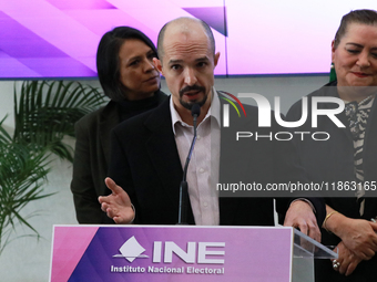 Guadalupe Taddei, president of the National Electoral Institute (INE), and electoral counselor Arturo Castillo participate in a press confer...