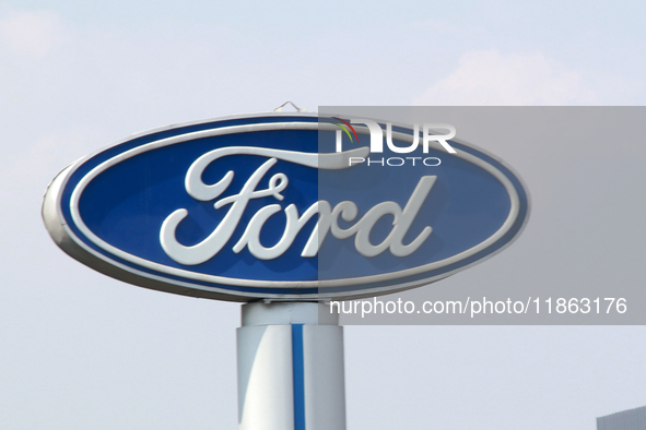 The logo of the American multinational automobile manufacturing company Ford Motor Company is seen in Mexico City, Mexico, on December 12, 2...