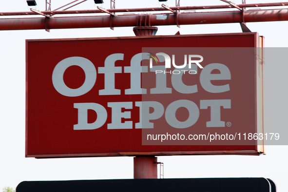 The logo of the Office Depot retail company, which sells office supplies, technology, furniture, school supplies, and more, is seen outside...