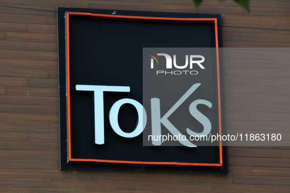 The logo of the Mexican family restaurant company Toks is visible on a facade in Mexico City, Mexico, on December 12, 2024. (Photo Illustrat...