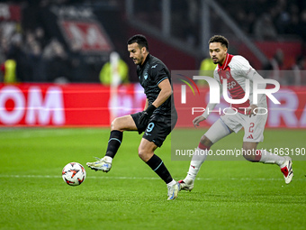 Lazio forward Pedro Rodriguez and AFC Ajax Amsterdam defender Devyne Rensch play during the match between Ajax and Lazio at the Johan Cruijf...