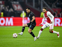 Lazio forward Pedro Rodriguez and AFC Ajax Amsterdam defender Devyne Rensch play during the match between Ajax and Lazio at the Johan Cruijf...