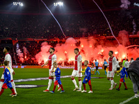 AFC Ajax Amsterdam defender Josip Sutalo, AFC Ajax Amsterdam defender Youri Baas, and AFC Ajax Amsterdam forward Steven Berghuis participate...