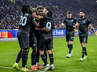 Lazio midfielders Loum Tchaouna and Fisayo Dele-Bashiru, along with Lazio forward Pedro Rodriguez, celebrate a goal during the match between...