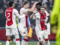 AFC Ajax Amsterdam defender Devyne Rensch, AFC Ajax Amsterdam defender Youri Baas, AFC Ajax Amsterdam forward Bertrand Traore, and AFC Ajax...