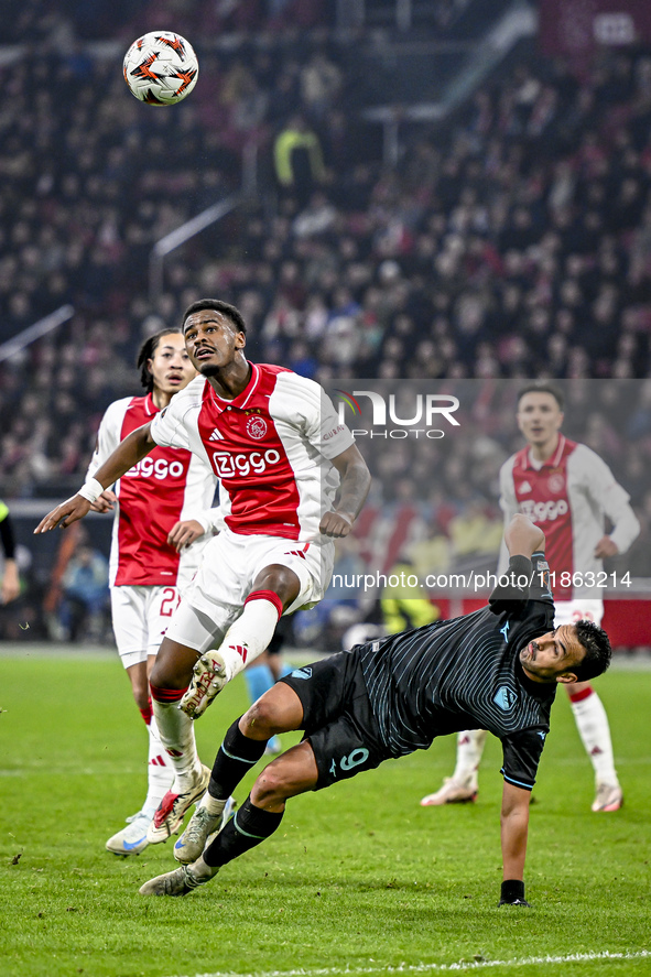 AFC Ajax Amsterdam defender Jorrel Hato and Lazio forward Pedro Rodriguez play during the match between Ajax and Lazio at the Johan Cruijff...