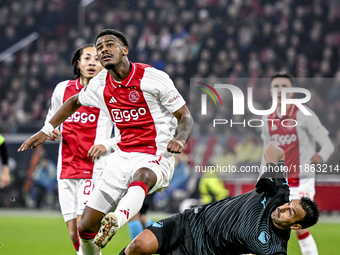 AFC Ajax Amsterdam defender Jorrel Hato and Lazio forward Pedro Rodriguez play during the match between Ajax and Lazio at the Johan Cruijff...