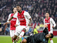 AFC Ajax Amsterdam defender Jorrel Hato and Lazio forward Pedro Rodriguez play during the match between Ajax and Lazio at the Johan Cruijff...