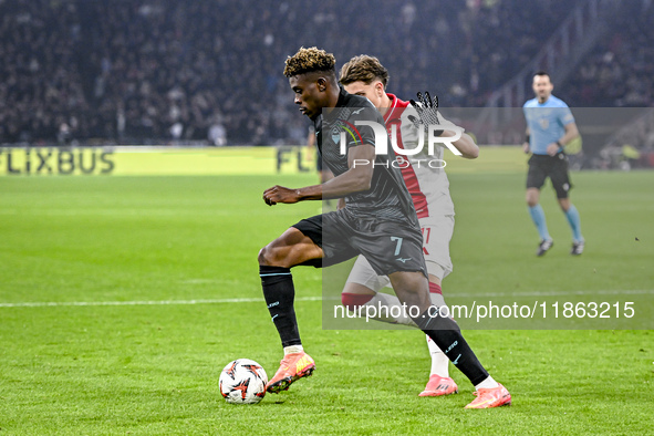 Lazio midfielder Fisayo Dele-Bashiru plays during the match between Ajax and Lazio at the Johan Cruijff ArenA for the UEFA Europa League - L...