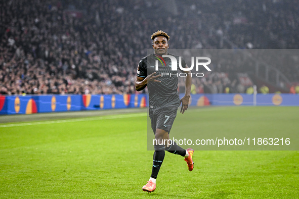 Lazio midfielder Fisayo Dele-Bashiru plays during the match between Ajax and Lazio at the Johan Cruijff ArenA for the UEFA Europa League - L...