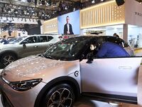 People view cars at the 16th Shandong International Auto Show in Qingdao, China, on December 13, 2024. (