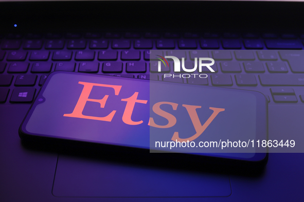 The Etsy, Inc. logo appears on the screen of a smartphone in Reno, United States, on December 12, 2024 