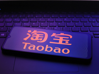 The Taobao logo appears on the screen of a smartphone in Reno, United States, on December 12, 2024 (