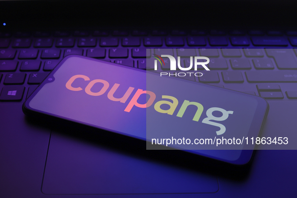 The Coupang logo appears on the screen of a smartphone in Reno, United States, on December 12, 2024 