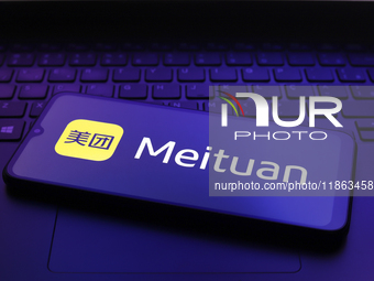 The Meituan logo appears on the screen of a smartphone in Reno, United States, on December 12, 2024 (