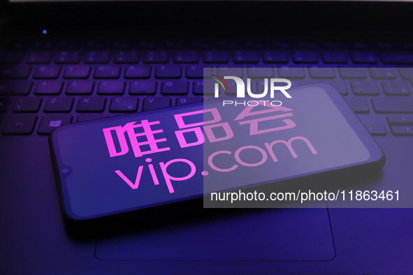 The Vipshop logo appears on the screen of a smartphone in Reno, United States, on December 12, 2024 