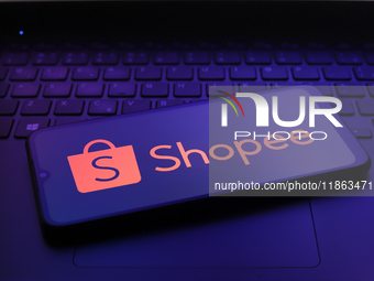 The Shopee logo appears on the screen of a smartphone in Reno, United States, on December 12, 2024. (