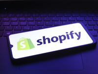 The Shopify logo appears on the screen of a smartphone in Reno, United States, on December 12, 2024 (