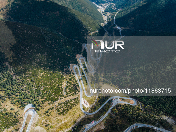 The winding road of National Highway 318 is in Ganzi Prefecture, Sichuan province, China, on October 18, 2024. 