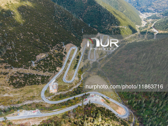 The winding road of National Highway 318 is in Ganzi Prefecture, Sichuan province, China, on October 18, 2024. 