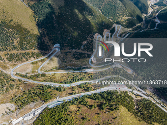 The winding road of National Highway 318 is in Ganzi Prefecture, Sichuan province, China, on October 18, 2024. (