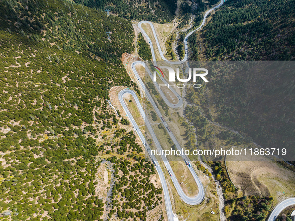 The winding road of National Highway 318 is in Ganzi Prefecture, Sichuan province, China, on October 18, 2024. 