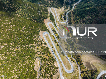 The winding road of National Highway 318 is in Ganzi Prefecture, Sichuan province, China, on October 18, 2024. (