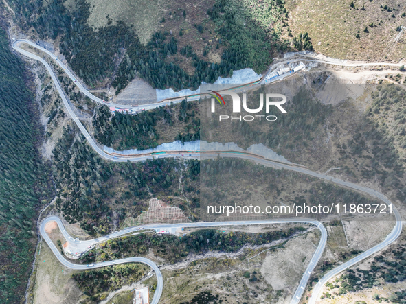 The winding road of National Highway 318 is in Ganzi Prefecture, Sichuan province, China, on October 18, 2024. 