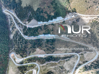 The winding road of National Highway 318 is in Ganzi Prefecture, Sichuan province, China, on October 18, 2024. (