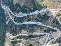 The winding road of National Highway 318 is in Ganzi Prefecture, Sichuan province, China, on October 18, 2024. (