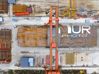 Workers build a new energy vehicle ro-ro ship at the Huaxing Ship Construction base in Zigui County, Yichang City, Hubei province, China, on...