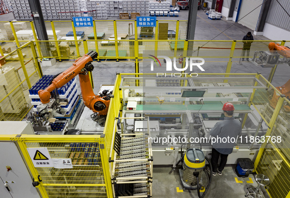 Workers build a new energy vehicle ro-ro ship at the Huaxing Ship Construction base in Zigui County, Yichang City, Hubei province, China, on...