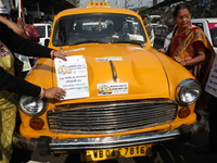 Supporters of the Indian National Congress take part in a protest against the Calcutta High Court's 2008 order that no commercial vehicle ol...