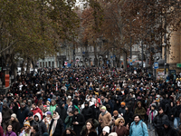 Private sector workers, students, and protesters take to the streets for a demonstration against the Georgian government's postponement of E...