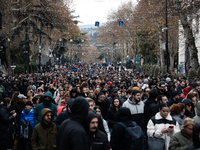 Private sector workers, students, and protesters take to the streets for a demonstration against the Georgian government's postponement of E...