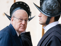 Lebanon's Prime Minister Najib Mikati arrives at the St. Damaso courtyard for a private audience with Pope Francis at the Vatican on Decembe...