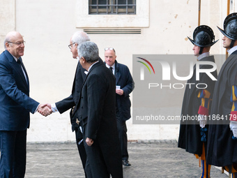 Lebanon's Prime Minister Najib Mikati arrives at the St. Damaso courtyard for a private audience with Pope Francis at the Vatican on Decembe...