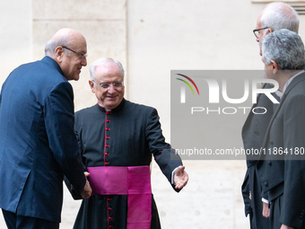 Lebanon's Prime Minister Najib Mikati arrives at the St. Damaso courtyard for a private audience with Pope Francis at the Vatican on Decembe...