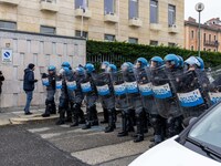 During a student march, a clash occurs in front of the Polytechnic University in Turin, Italy, on December 13, 2024. The students attempt to...