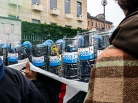 During a student march, a clash occurs in front of the Polytechnic University in Turin, Italy, on December 13, 2024. The students attempt to...